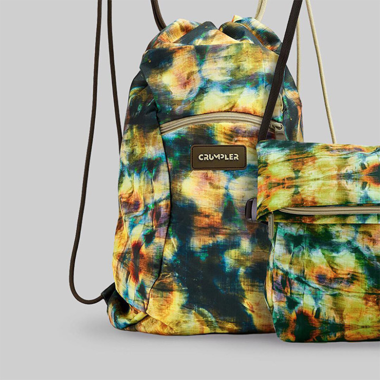 澳洲Crumpler小野人箱包品牌新logo設計，由字母組成的抽象人物