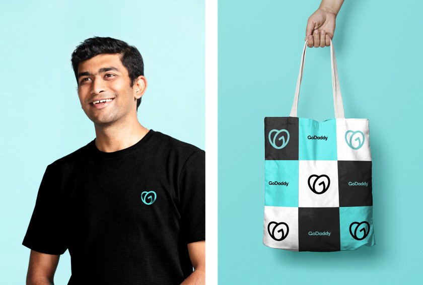 GoDaddy 域名注冊商和網(wǎng)站空間托管公司心形logo設(shè)計(jì)vi設(shè)計(jì)