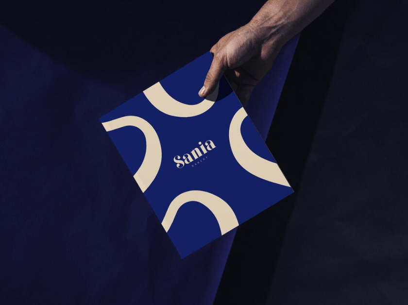 sania 烘培面包店品牌vi形象設(shè)計，寶藍色面包手繪線條輪廓圖案
